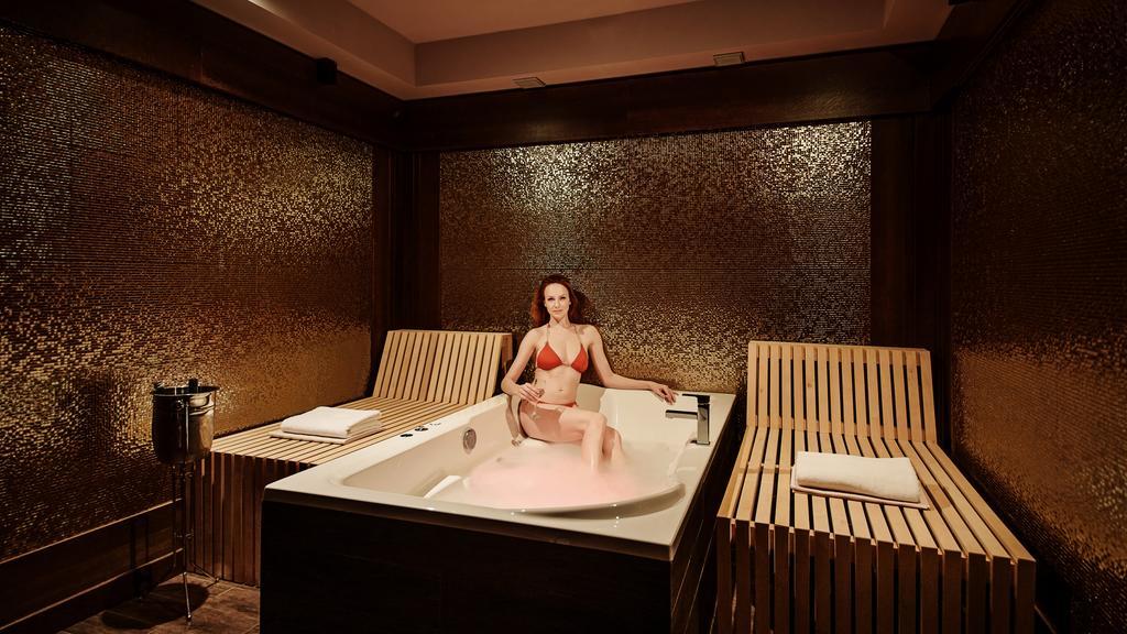 Grandezza Hotel Luxury Palace Brno Exterior photo A woman in a spa